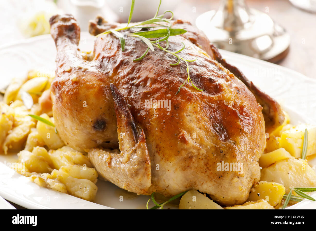 Chicken with potato roasted Stock Photo Alamy