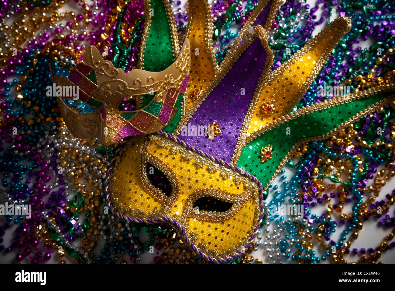 Download Mardi Gras Mask On Colorful Beads Stock Photo Alamy PSD Mockup Templates