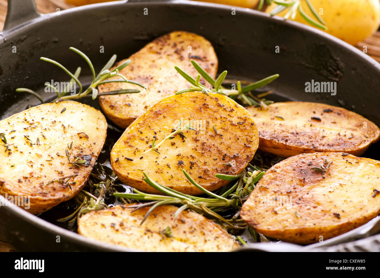 Roasted potato with rosemary Stock Photo