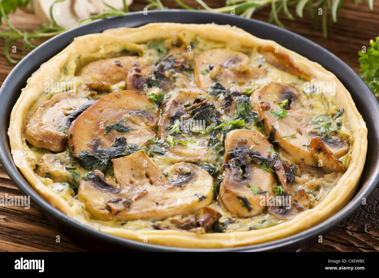 Quiche with mushrooms and spinach Stock Photo - Alamy