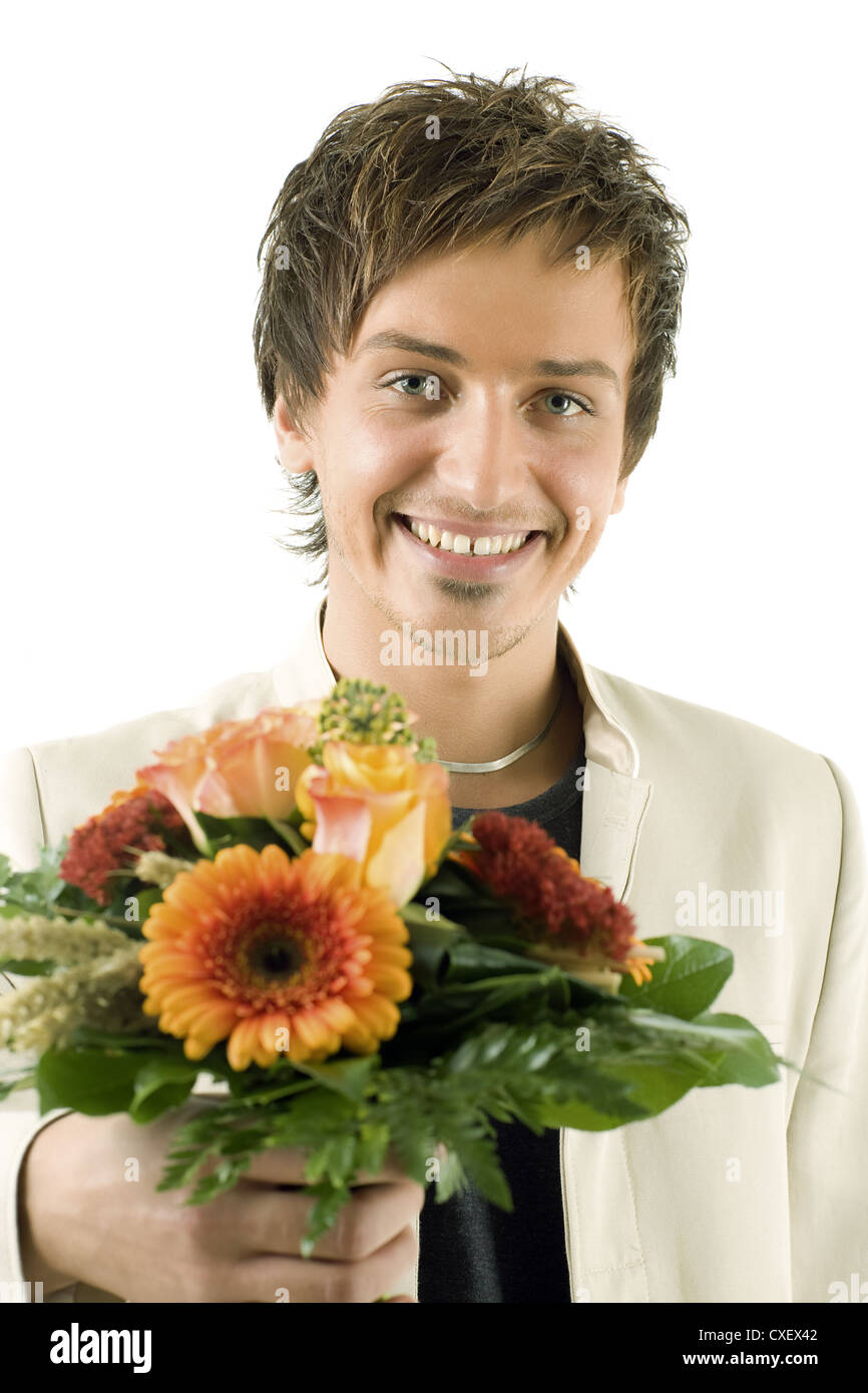 happy young man looking at camera Stock Photo - Alamy
