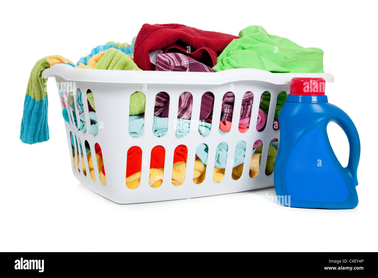 White plastic laundry basket with dirty clothes on a white background Stock Photo
