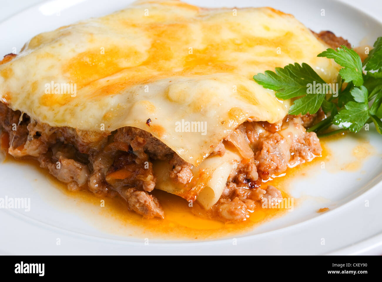 Portion beef lasagne hires stock photography and images Alamy