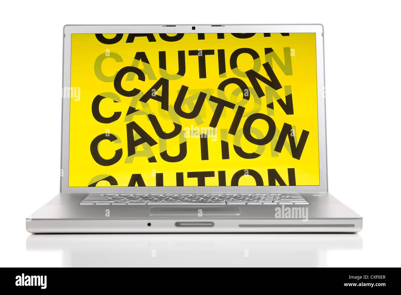 Caution tape completely covering the monitor screen of a gray laptop