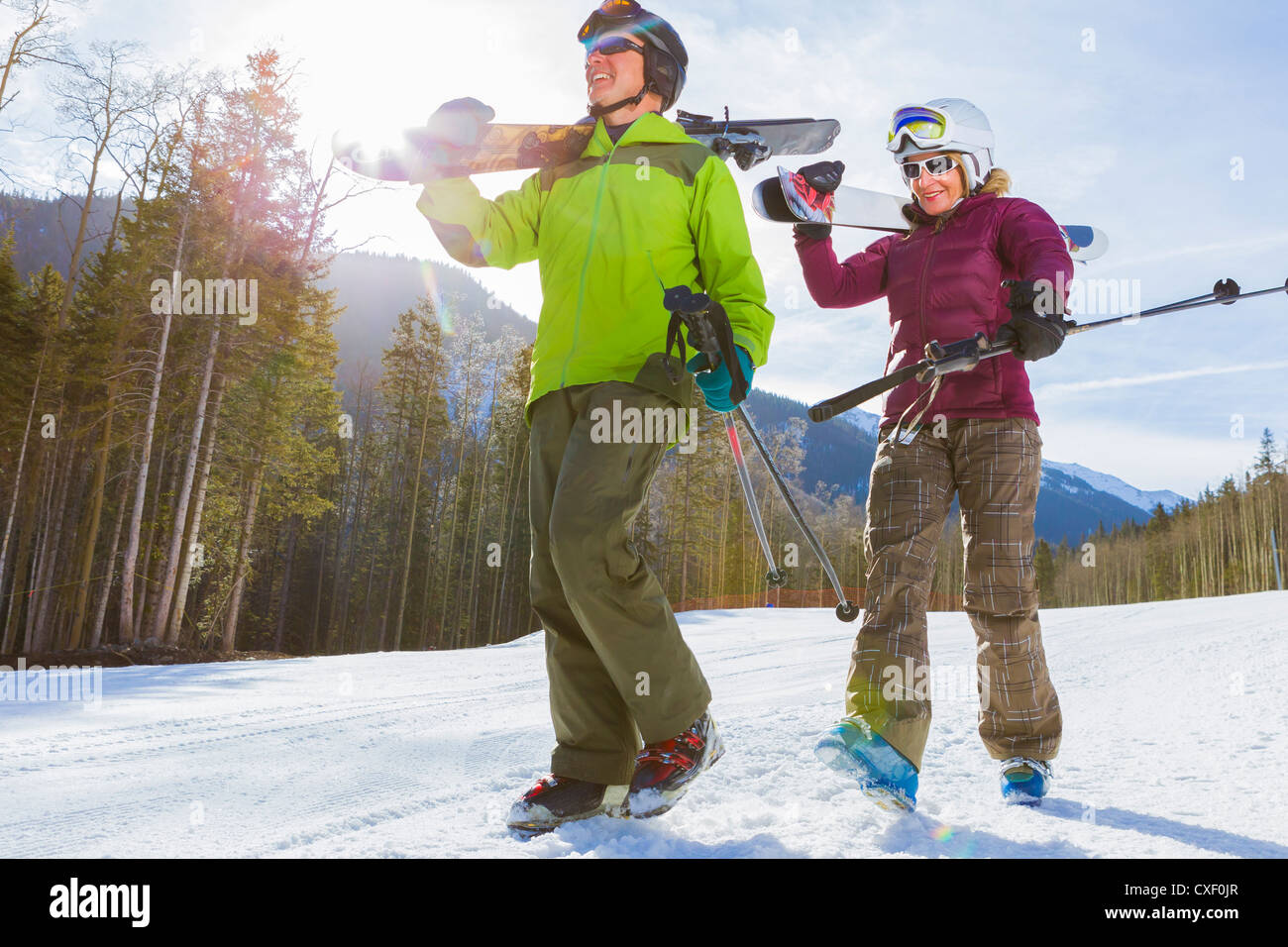 Man ski pole carrying hi-res stock photography and images - Alamy