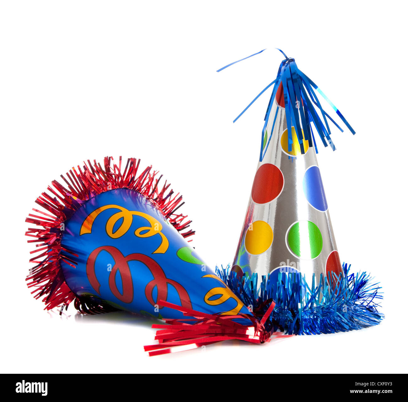 Bright party hats on a white background Stock Photo - Alamy