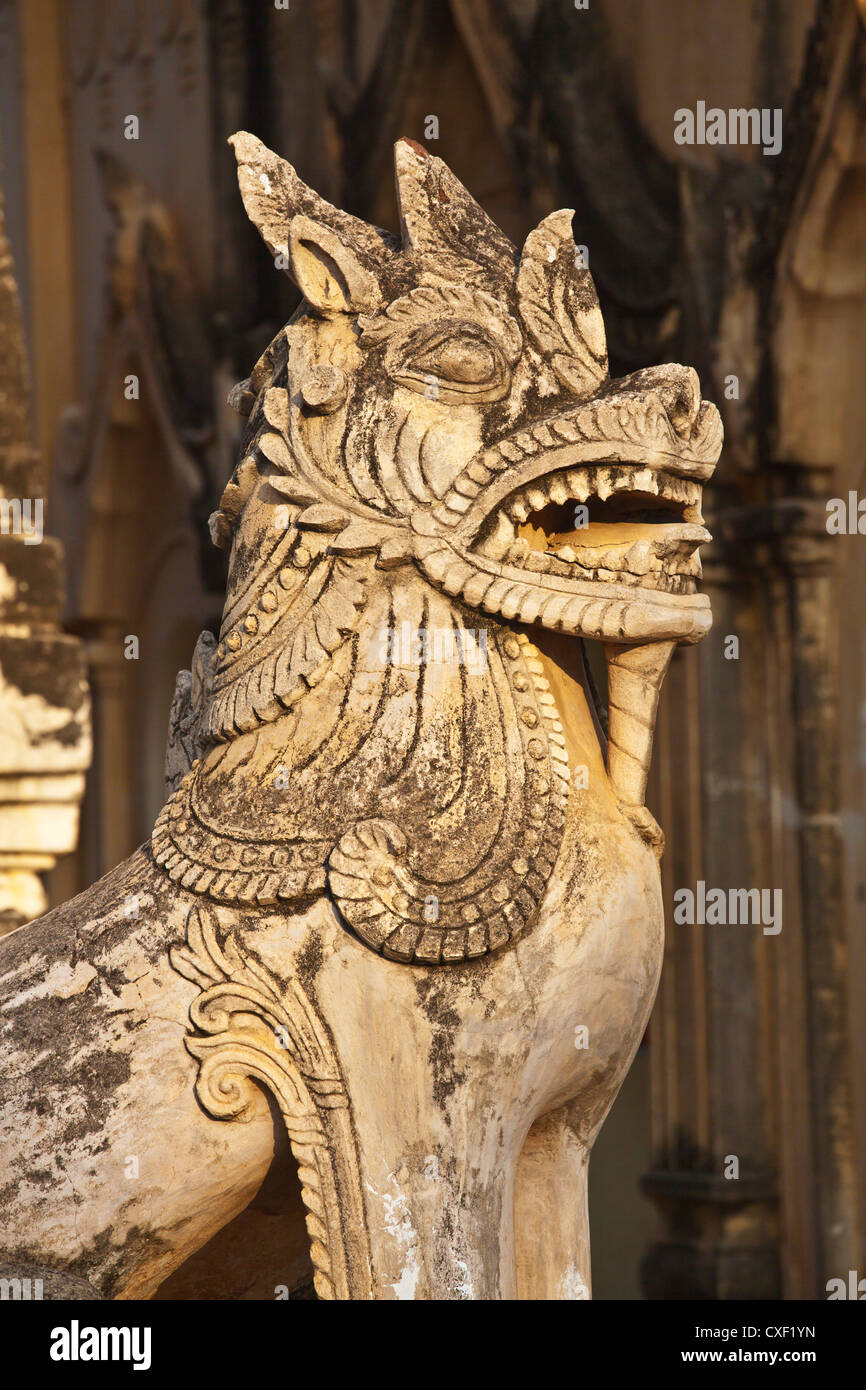 A CHINTHE is a mystical half lion half dragon guardian at ANANDA  TEMPLE built by King Kyanzittha around 1100 - BAGAN, MYANMAR Stock Photo