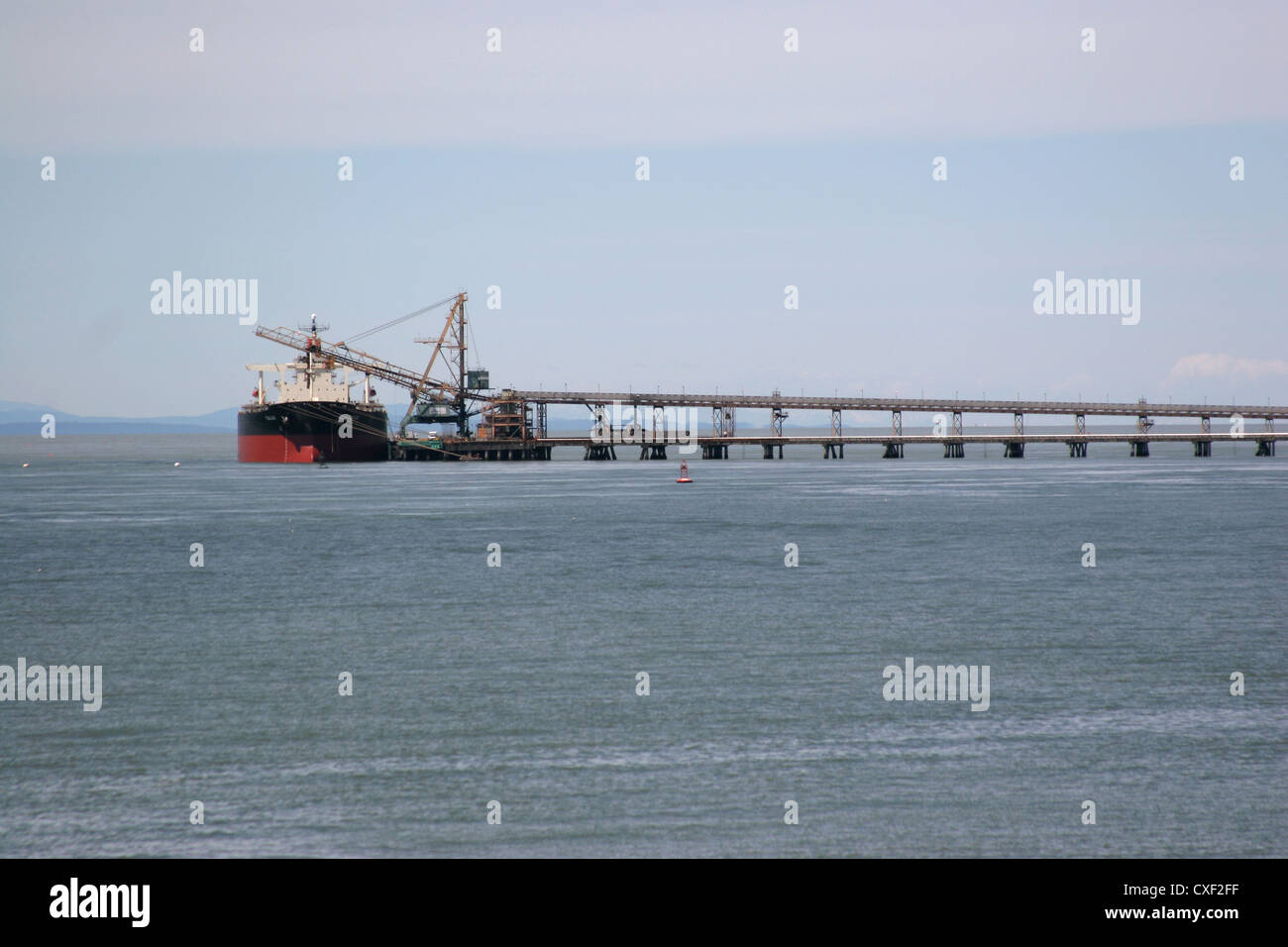 Container ship moored on dock Stock Photo