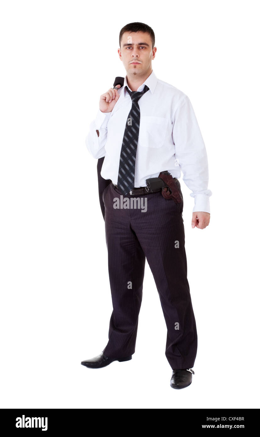 young man in black suit with gun Stock Photo