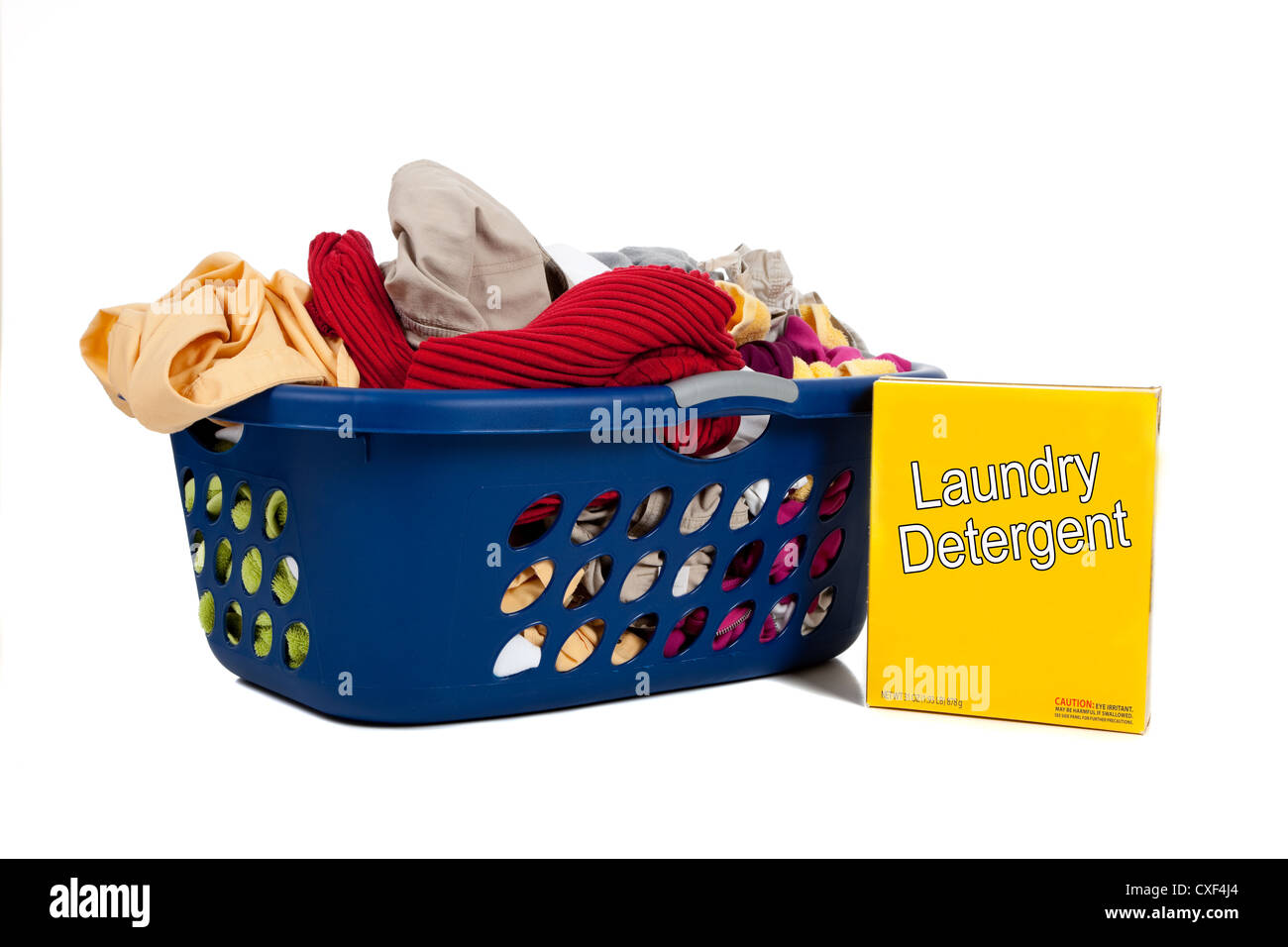 blue laundry basket with dirty clothes and a box of yellow laundry
