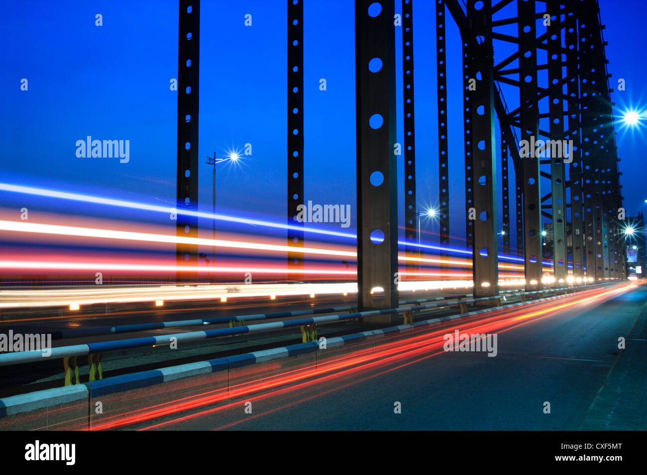 light trails on the steel bridge Stock Photo