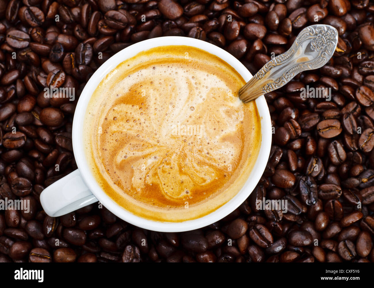 espresso-cup-in-coffee-beans-stock-photo-alamy