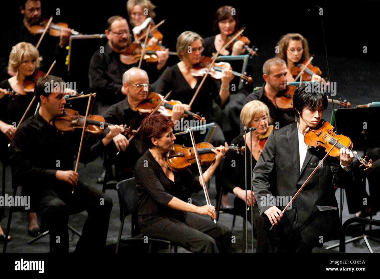 Wang Xiao (China) and The Magyar Radio Symphonic Orchestra perform in concert at MUPA on September 14, 2012 in Budapest Stock Photo