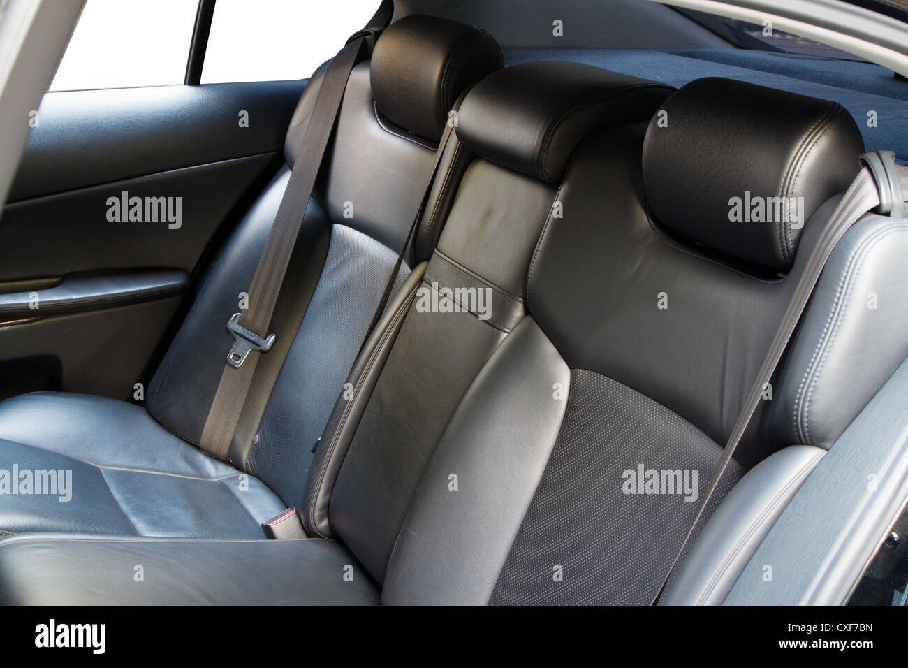 https://c8.alamy.com/comp/CXF7BN/leather-back-car-seats-with-active-headrest-CXF7BN.jpg