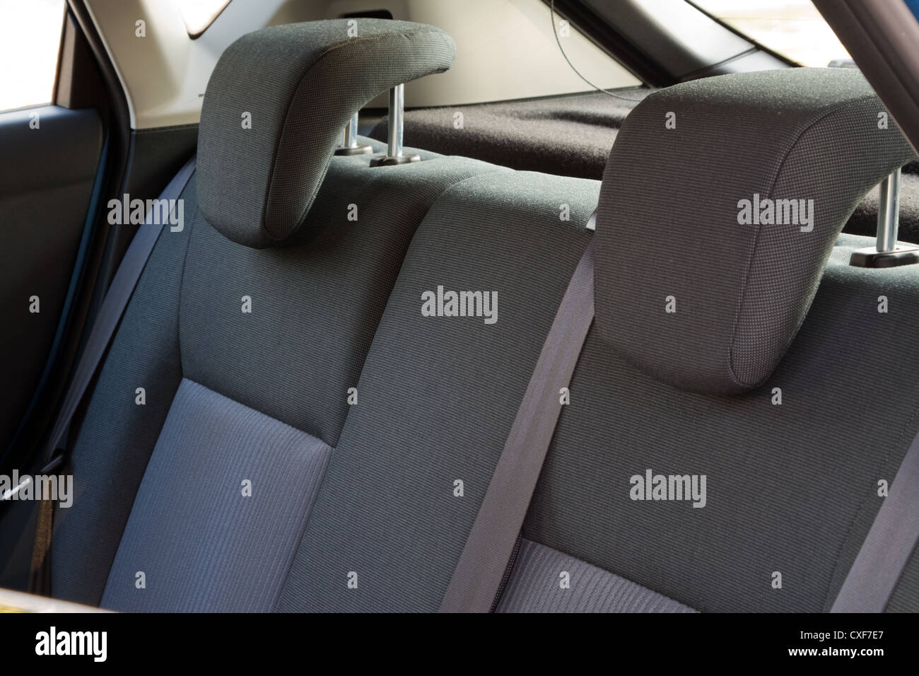Car interior - back car seats with active headrest Stock Photo