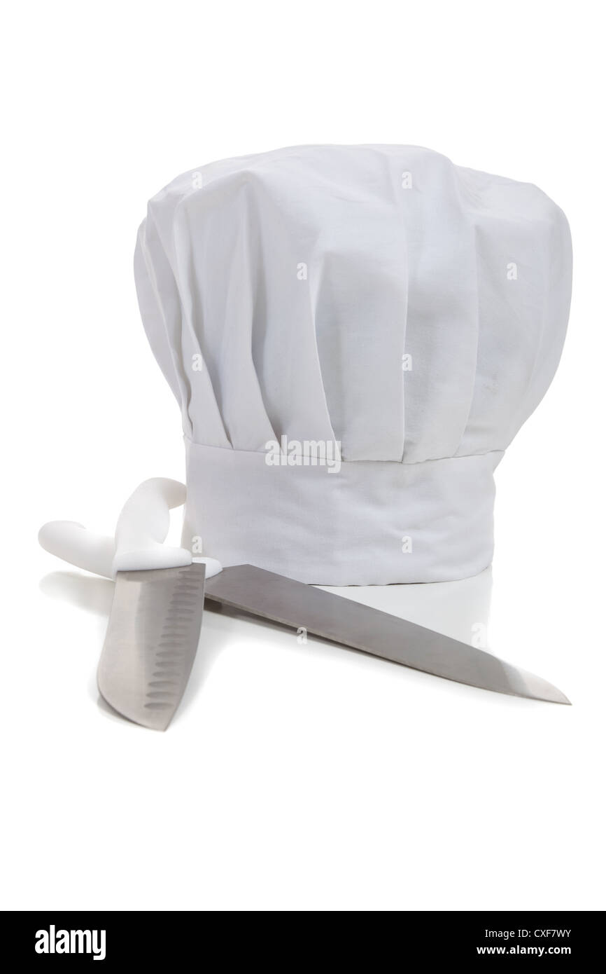 Chef hat and knives on a white background Stock Photo - Alamy