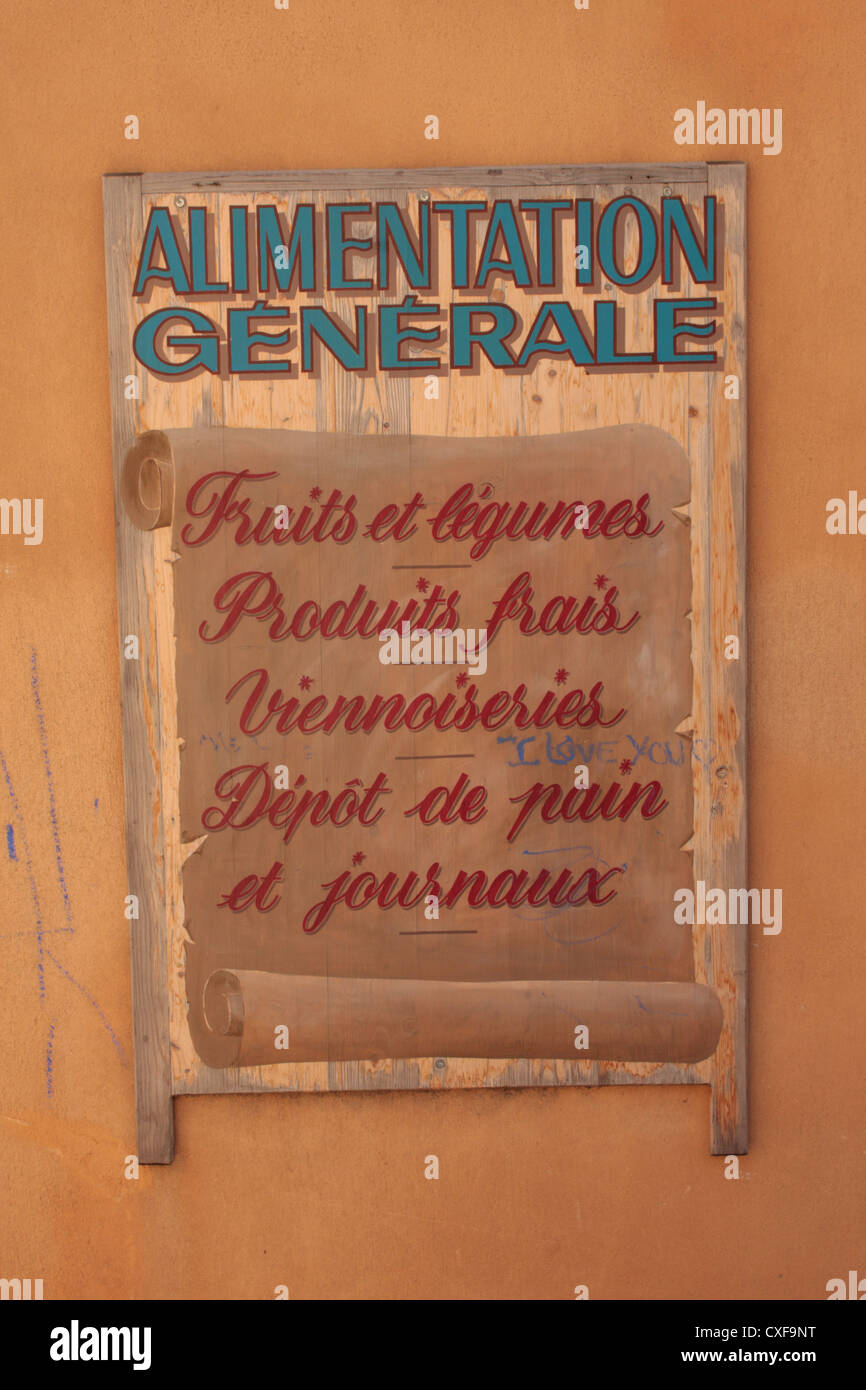 Sign on the outside of an 'Alimentation Generale' in the village of Bages Languedoc-Roussillon France Stock Photo