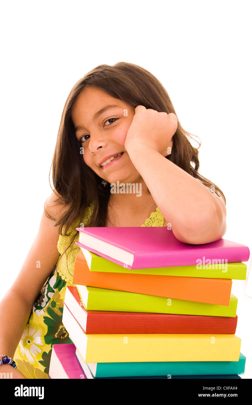 Happy young girl with colorful books Stock Photo - Alamy