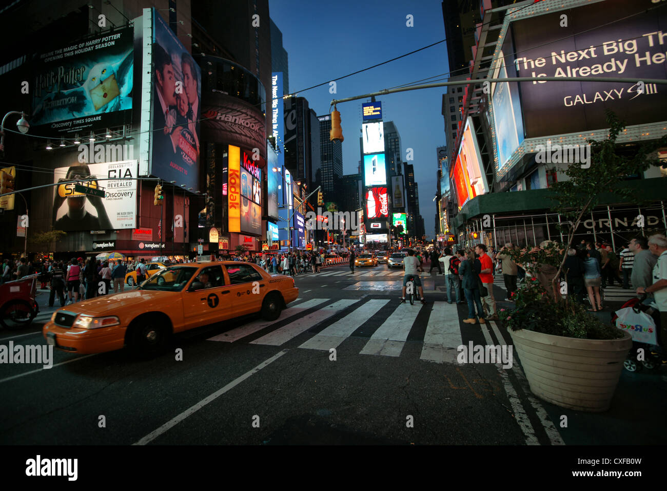 Evening shot of a busy times square in New York Stock Photo - Alamy