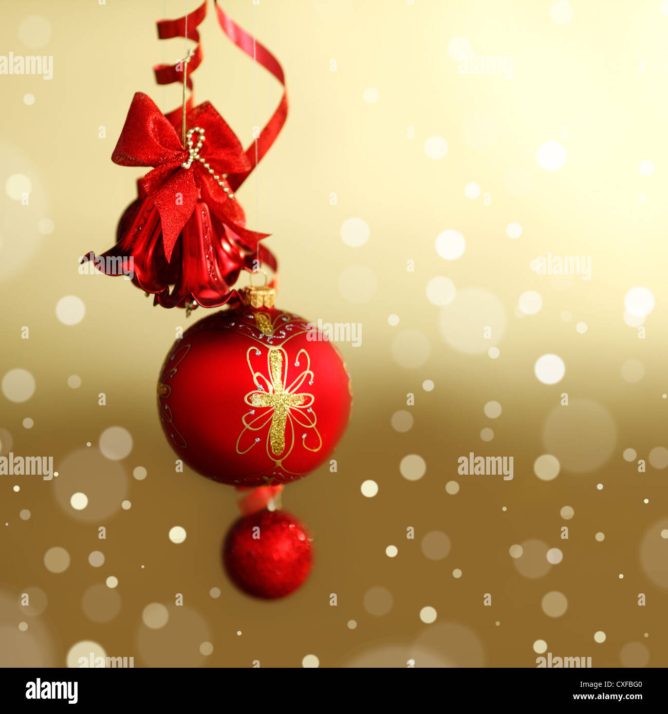 red christmas balls on gold background Stock Photo - Alamy