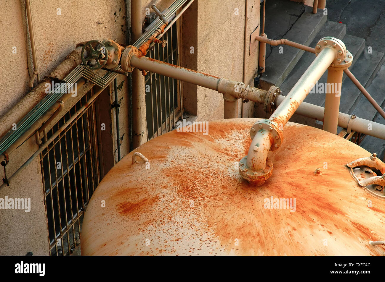 A super rusty boiler at the abandoned Ambassador Hotel on Wilshire Blvd in Los Angeles, California, USA. Now demolished. Stock Photo