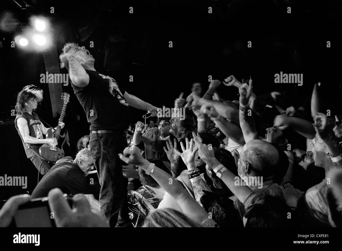black and white photo of a Jello Biafra and the Guantanamo School of Medicine concert in the Knitting Factory in New York City Stock Photo