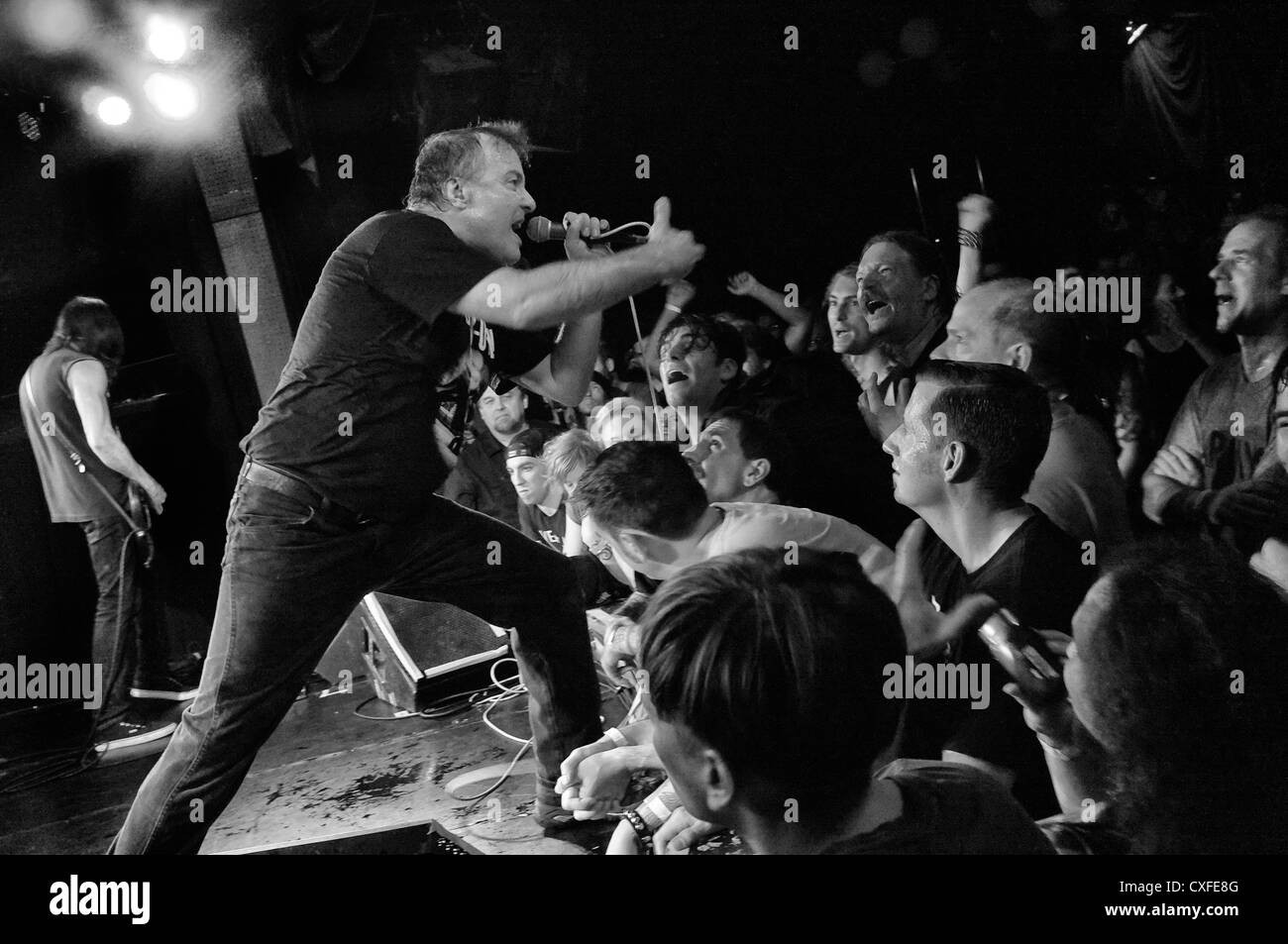 black and white photo of a Jello Biafra and the Guantanamo School of Medicine concert in the Knitting Factory in New York City Stock Photo