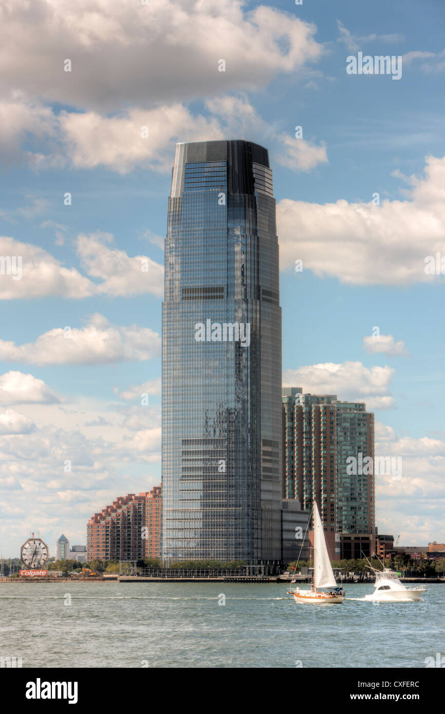 The Goldman Sachs Tower in Jersey City, the tallest building in New Jersey, overlooks the Hudson River on a summer afternoon. Stock Photo