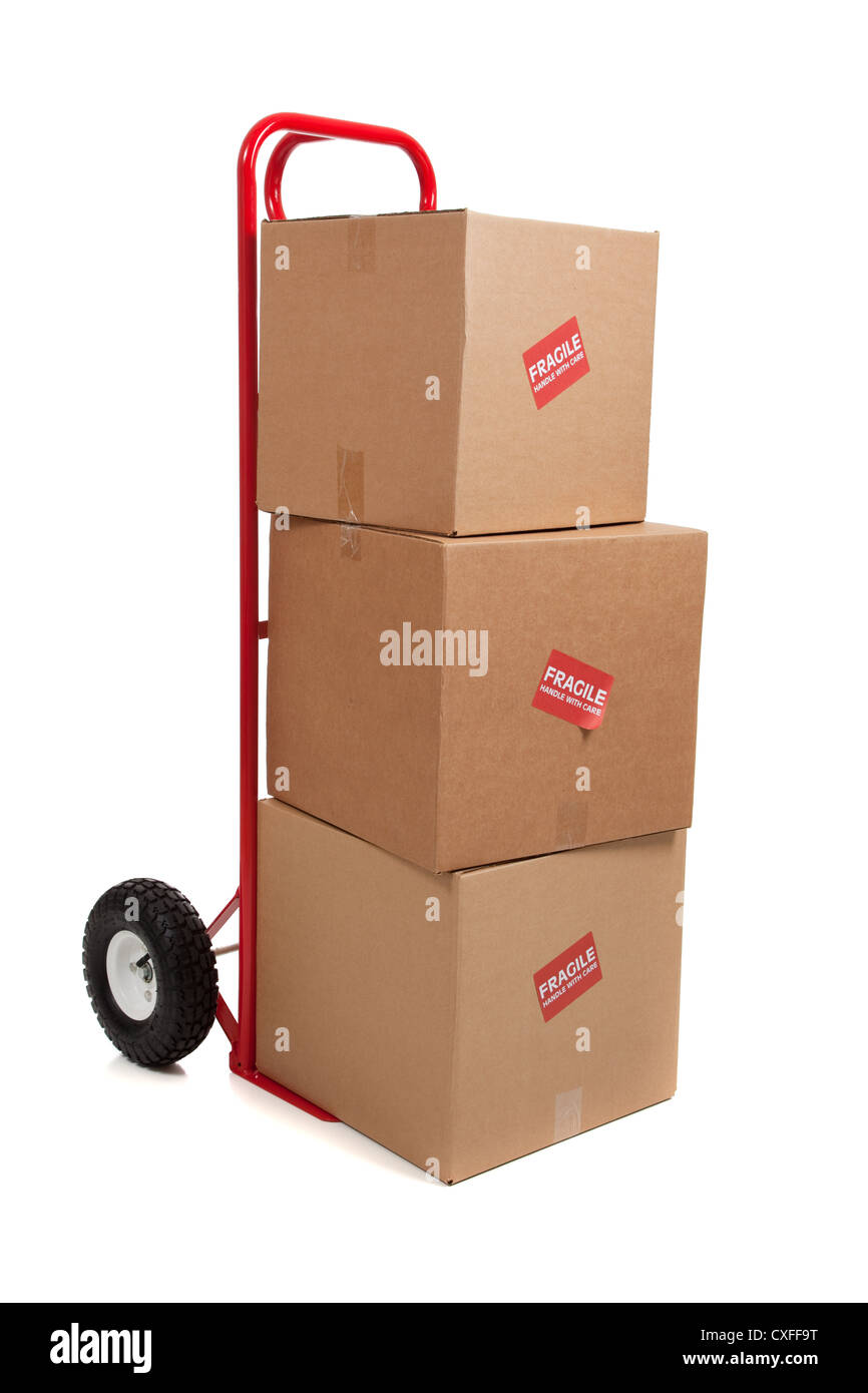 stack of moving boxes on a red dolly Stock Photo Alamy