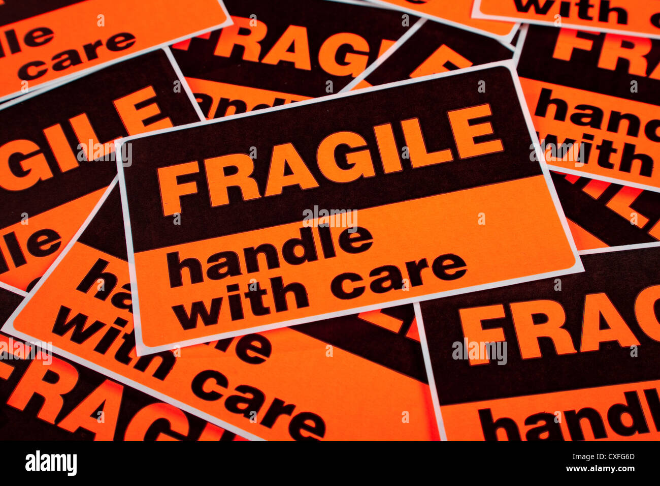 A background of orange fragile stickers Stock Photo