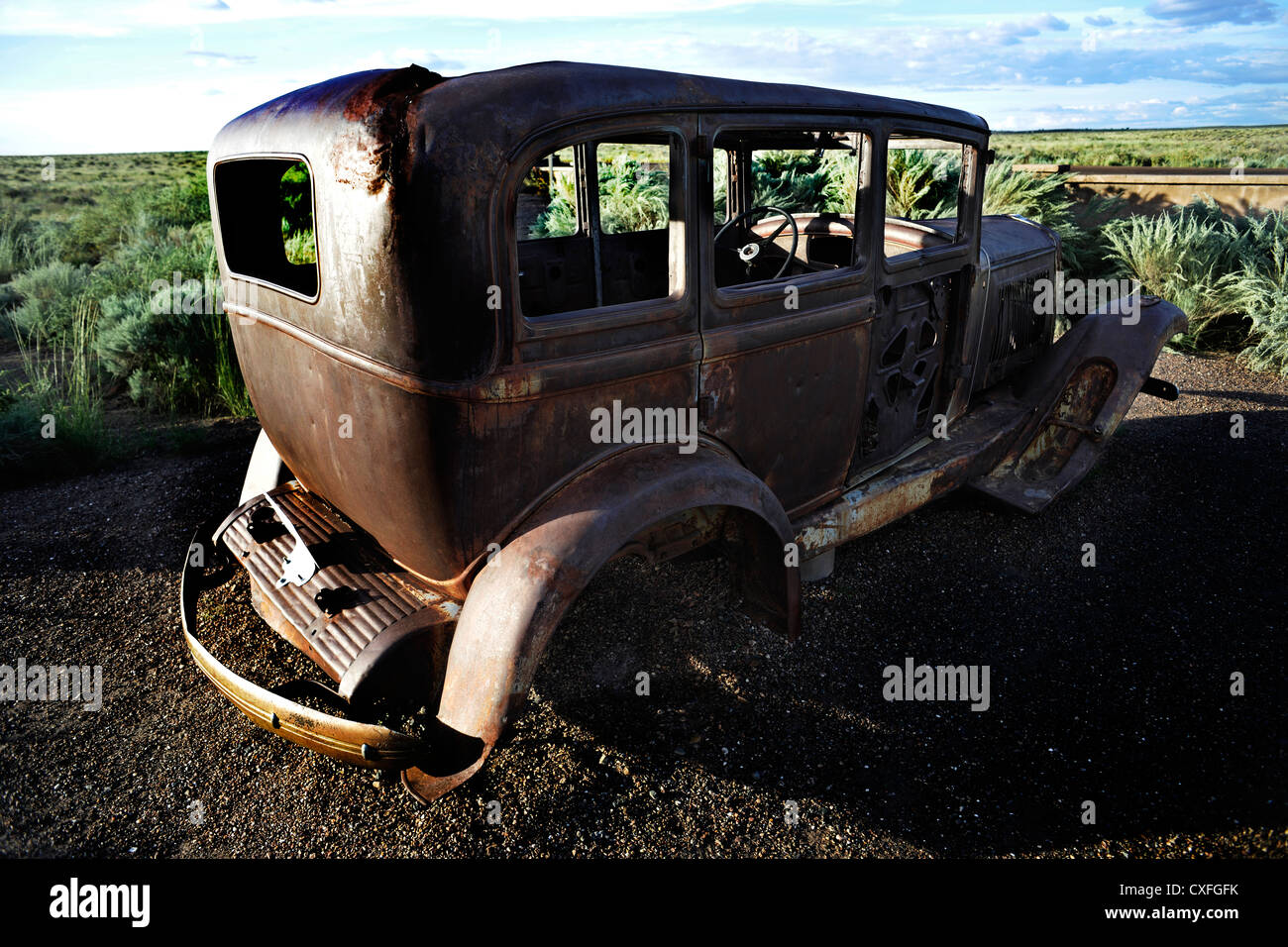 Abandoned rusted car on Route 66, Petrified Forest National Park in Arizona, USA Stock Photo