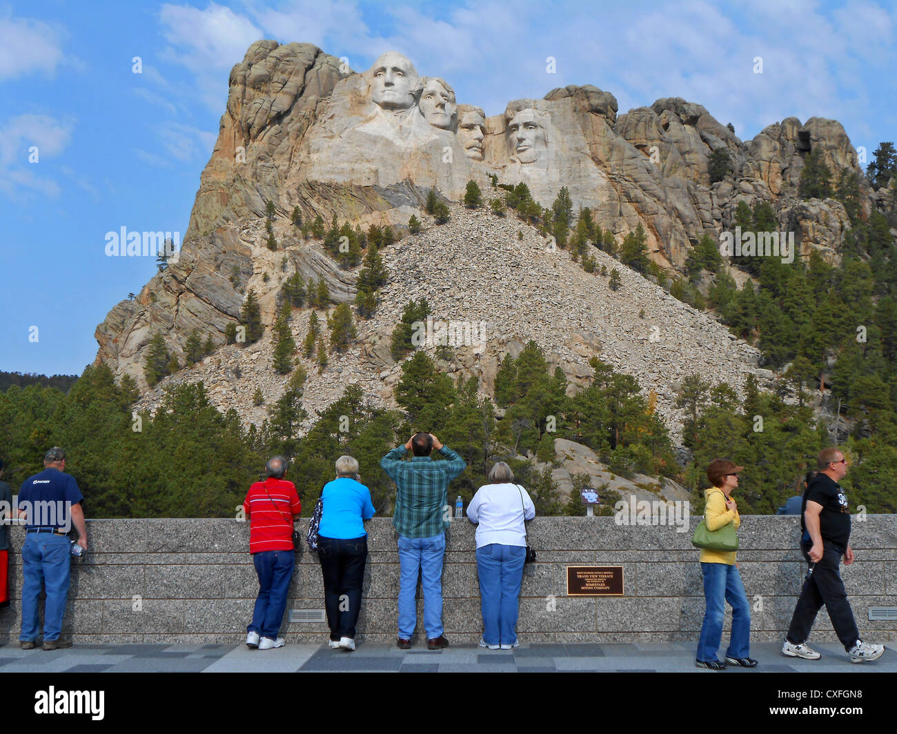 Tourist viewing Mt Rushmore at the visitors center in South Dakota Stock Photo