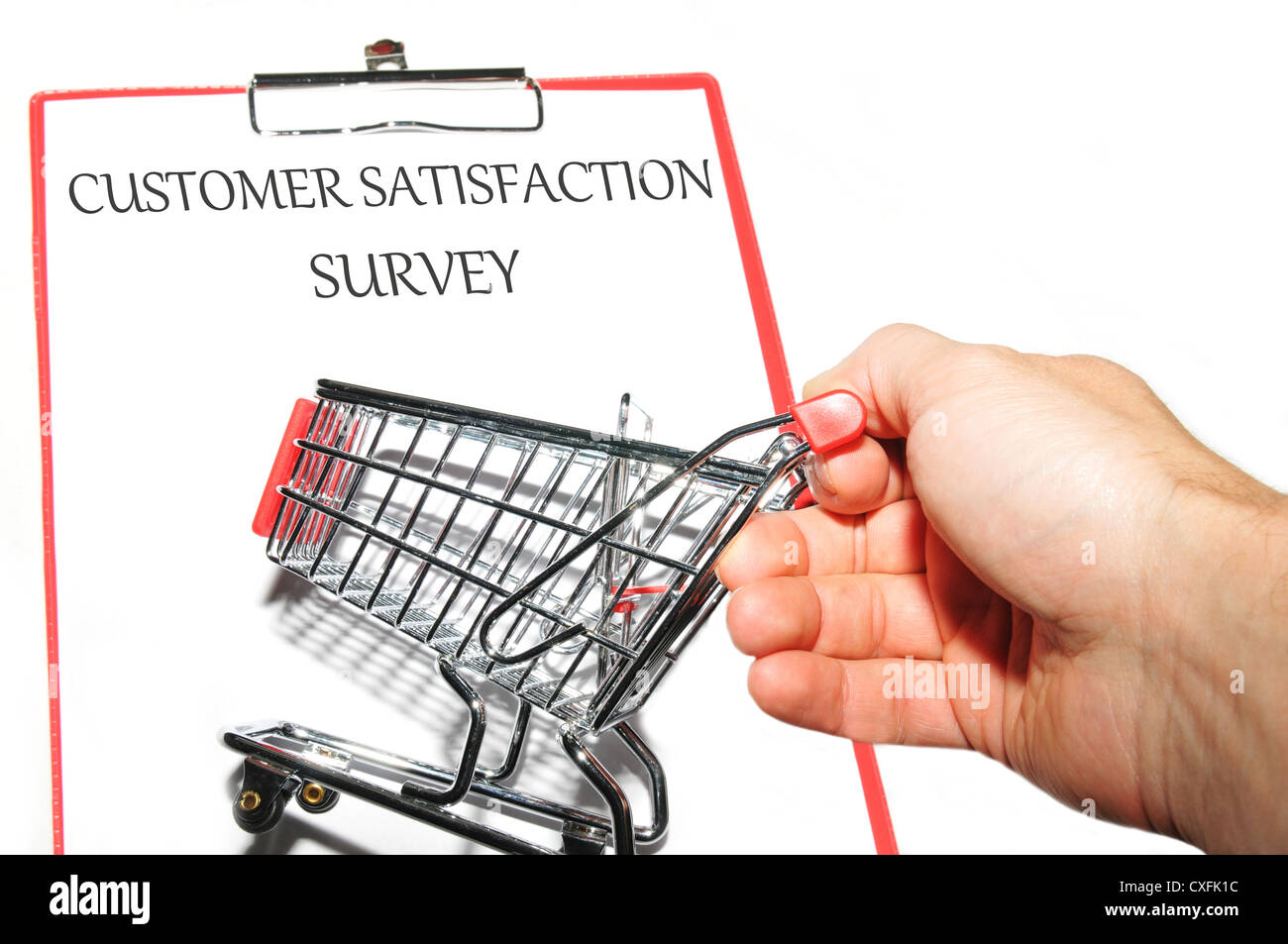 Customer service survey concept with clipboard and hand holding
