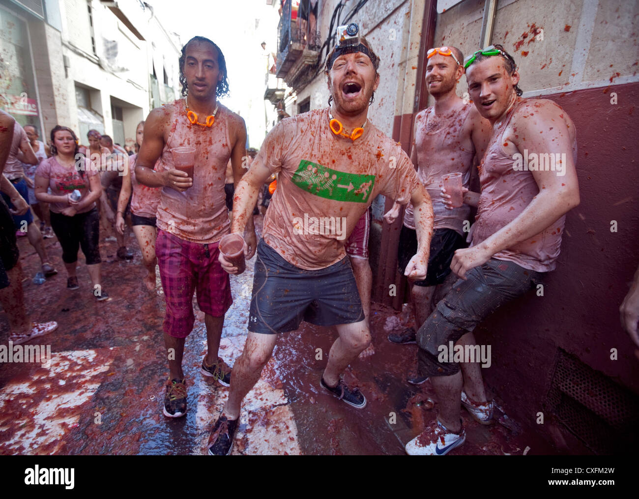 The Tomatina Festival in Buñol, Valencia, Spain where thousands of