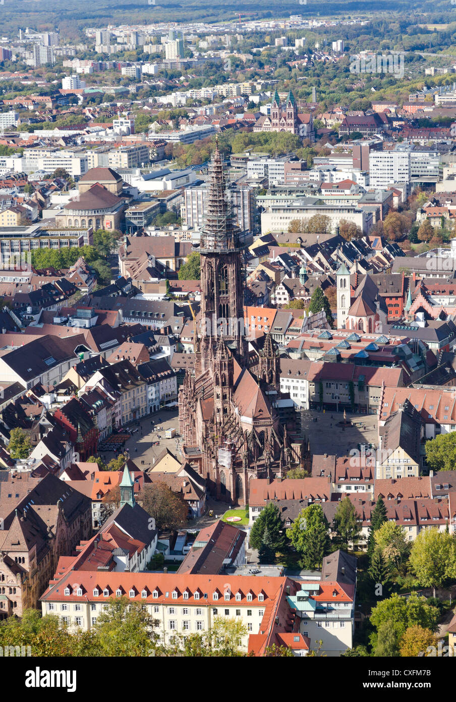 Old houses and minster with high tower of gothic town, Freiburg im