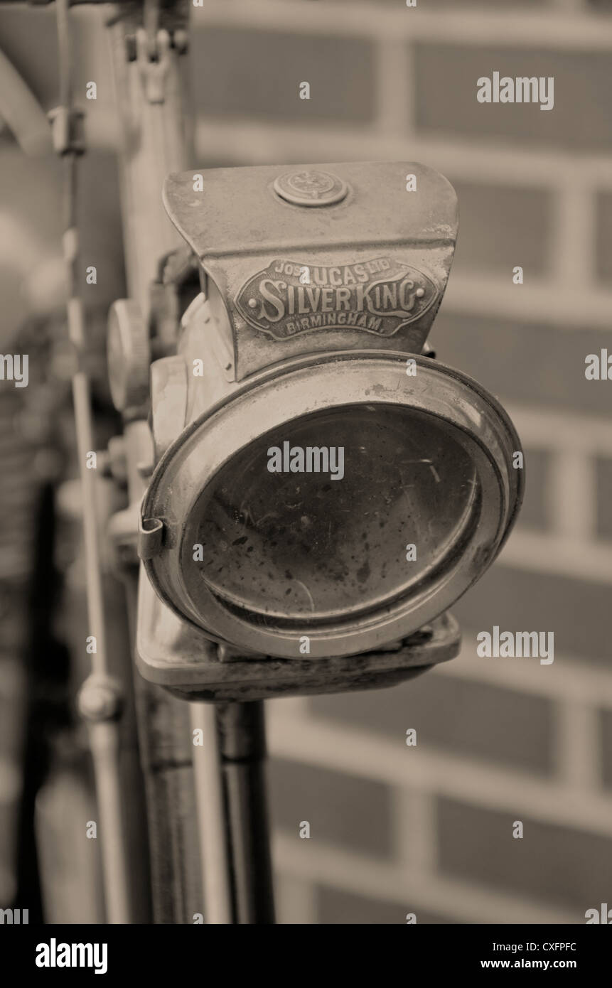 Lucas Silver King bicycle lamp circa 1912 mounted below handlebars on the  front of an old bicycle. Black and white image Stock Photo - Alamy