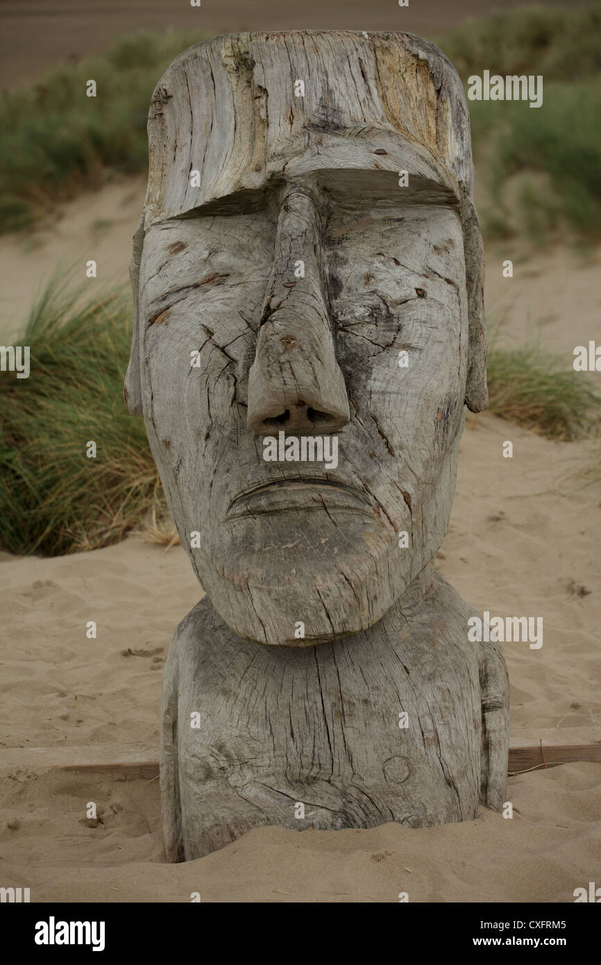 Wooden statue like the ones on Easter Island on the beach at Barmouth