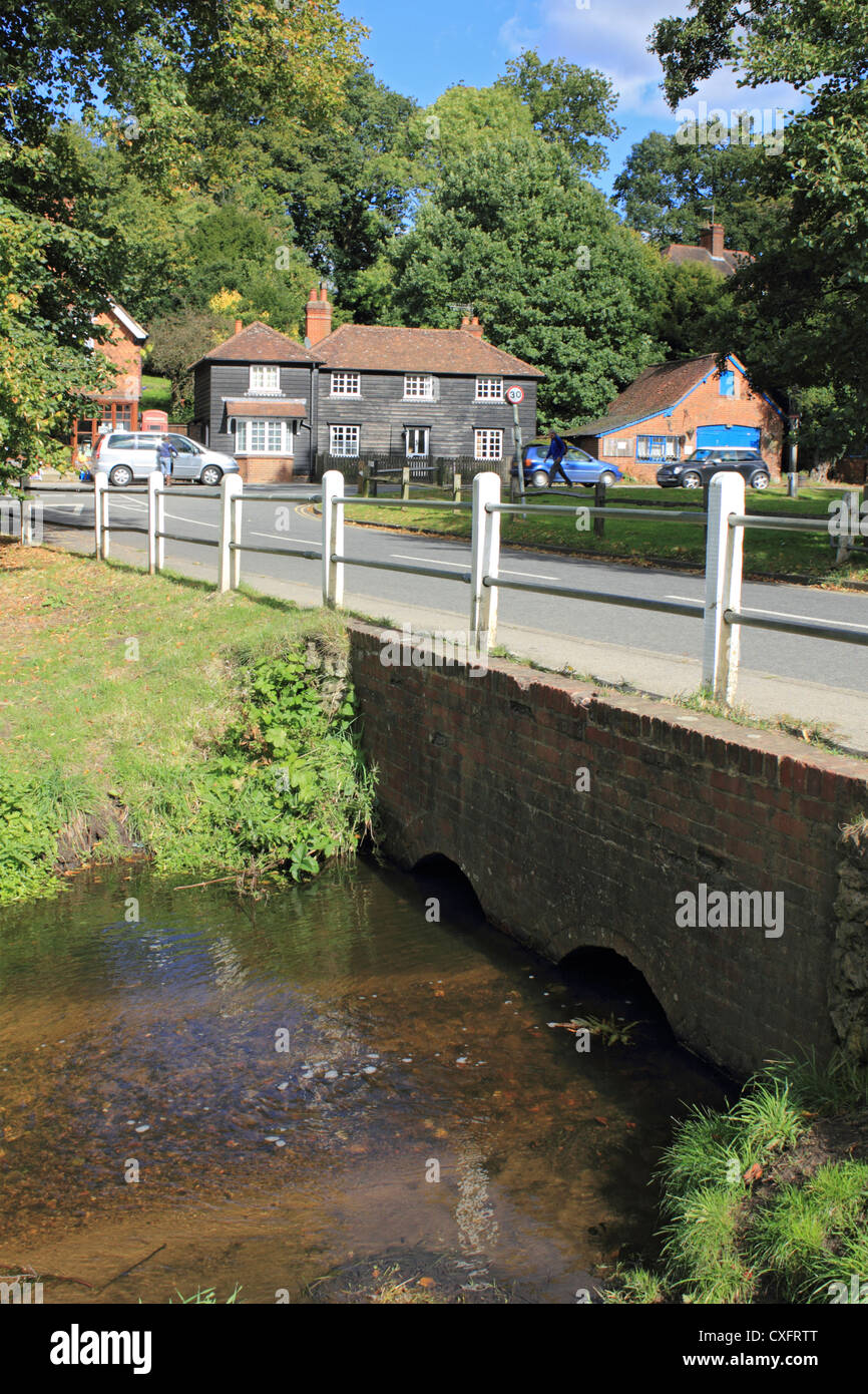 The Tilling Bourne river at Abinger Hammer near Dorking Surrey England