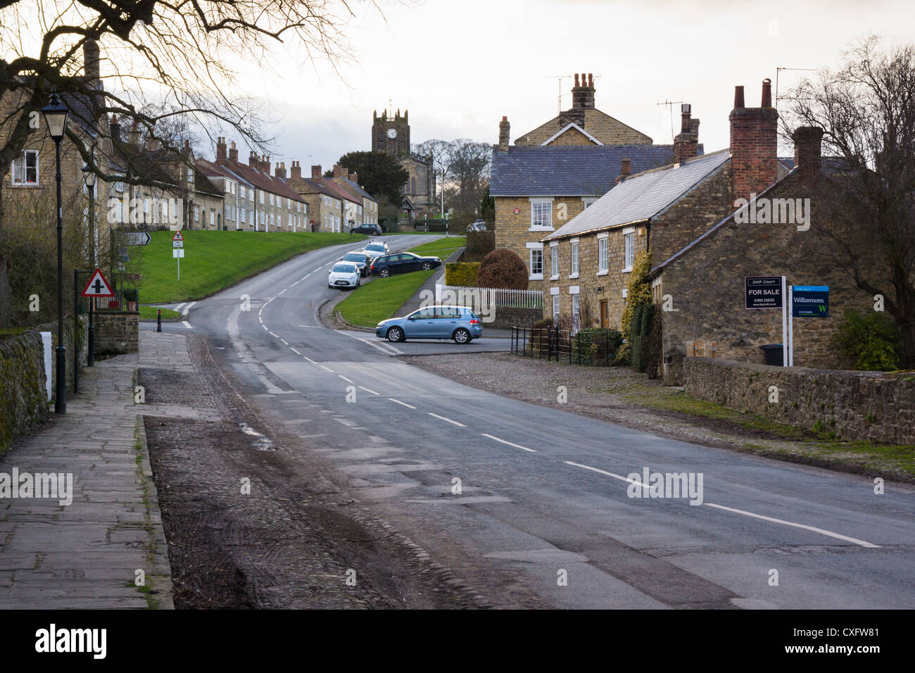 Main street through the centre of Coxwold in the North Yorkshire Moors. Stock Photo