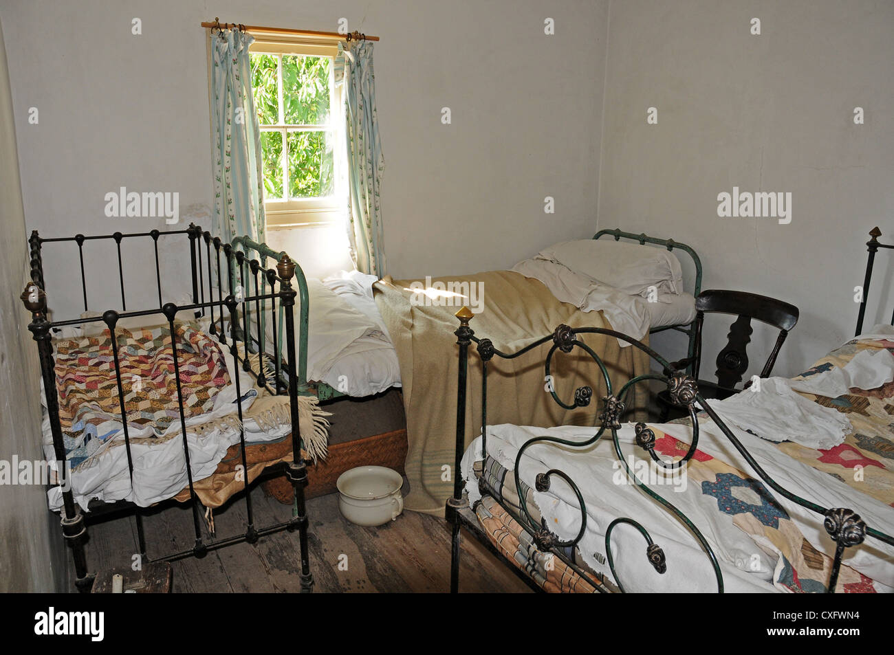 Children's bedroom in Whittaker's Cottages. Weald and Downland Open air Museum. Stock Photo