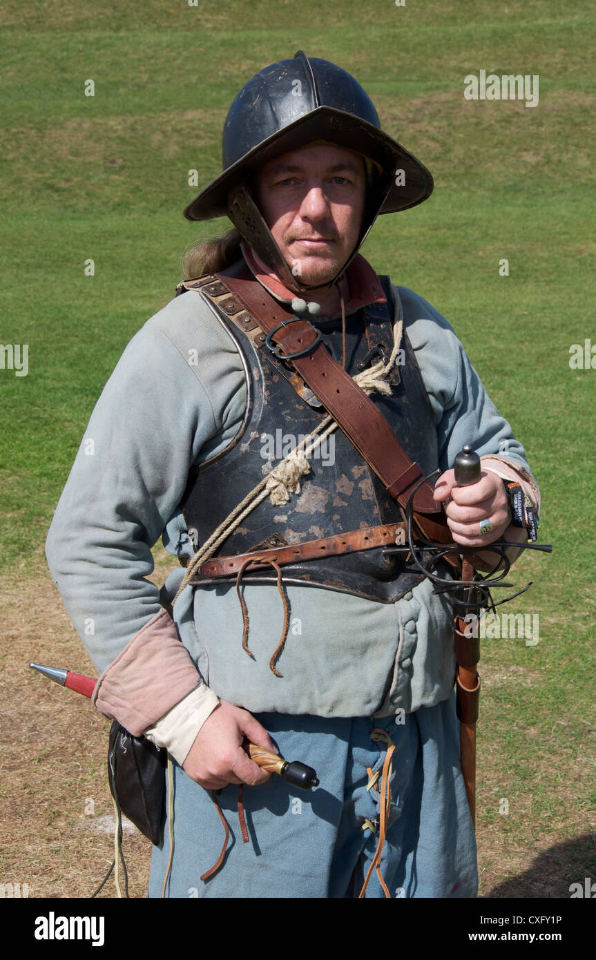 An English Civil War reenactor in the uniform of a Royalist foot soldier at a recreation of the