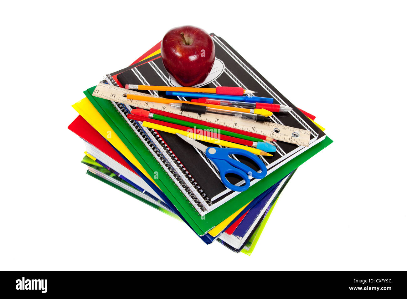 stack of school supplies with an apple Stock Photo