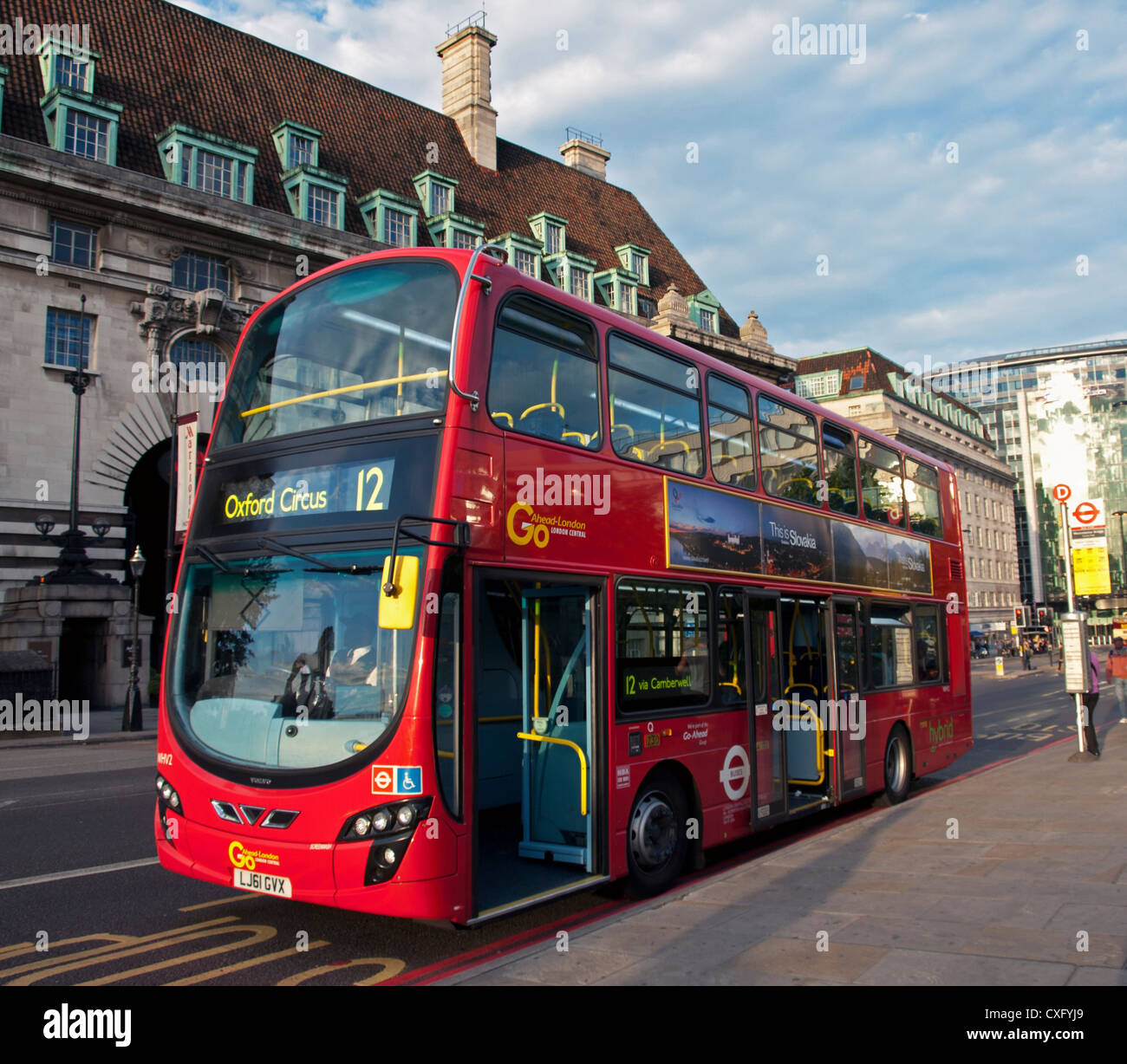 London bus at bus stop on Westminster Bridge Road showing Marriot Hotel in background. Stock Photo
