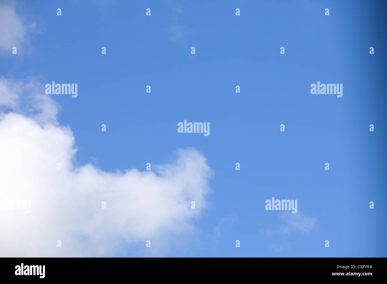 Deep blue sky background with white clouds Stock Photo Alamy