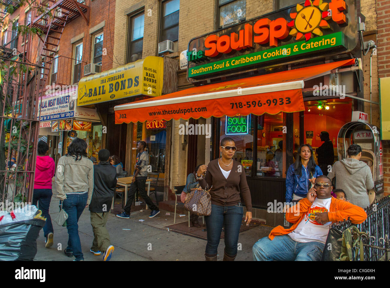 New York City, USA, Crowd People in Front of Soul Food Restaurant, 'The SOul Spot', during the Brooklyn Street Festival, 'Atlantic Antic', multicultural street, african americans Stock Photo