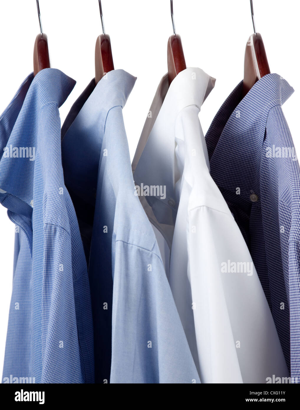 Assorted blue dress hanging on wooden hangers Stock Photo Alamy