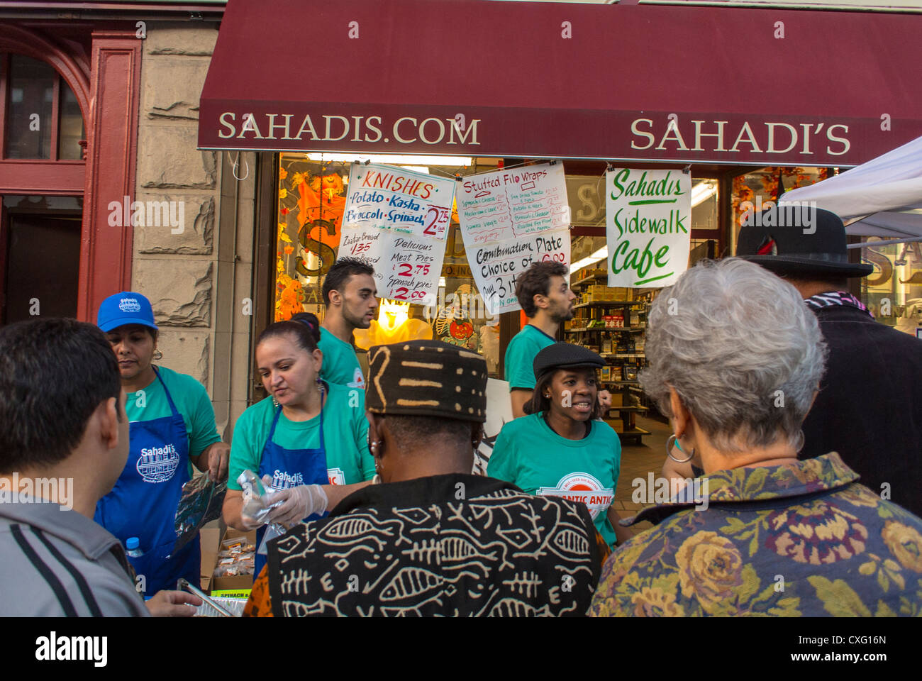 New York City, USA, People enjoying the Brooklyn Street Festival, 'Atlantic Antic', African Food Stall, Vendor, multiracial citizens Stock Photo