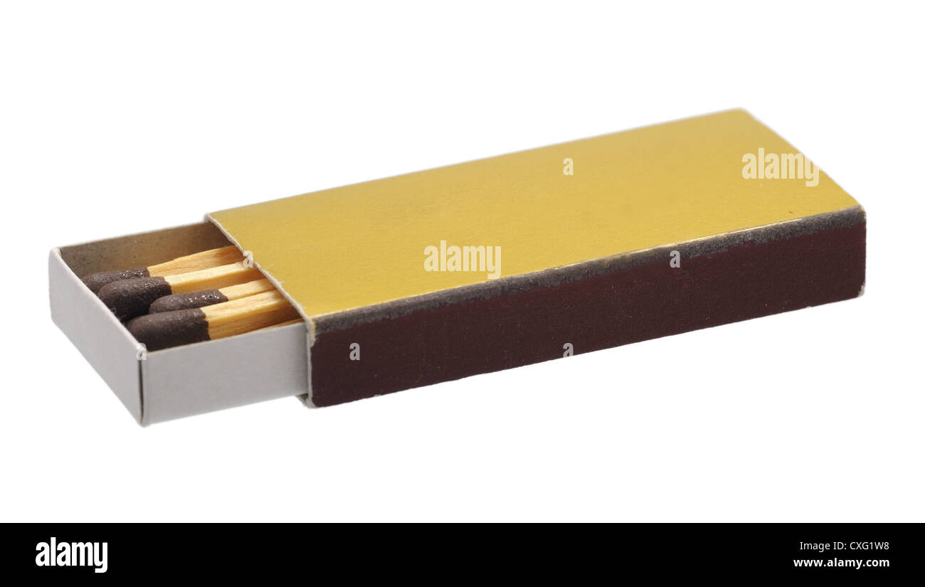 Golden box of matches on the glass surface Stock Photo