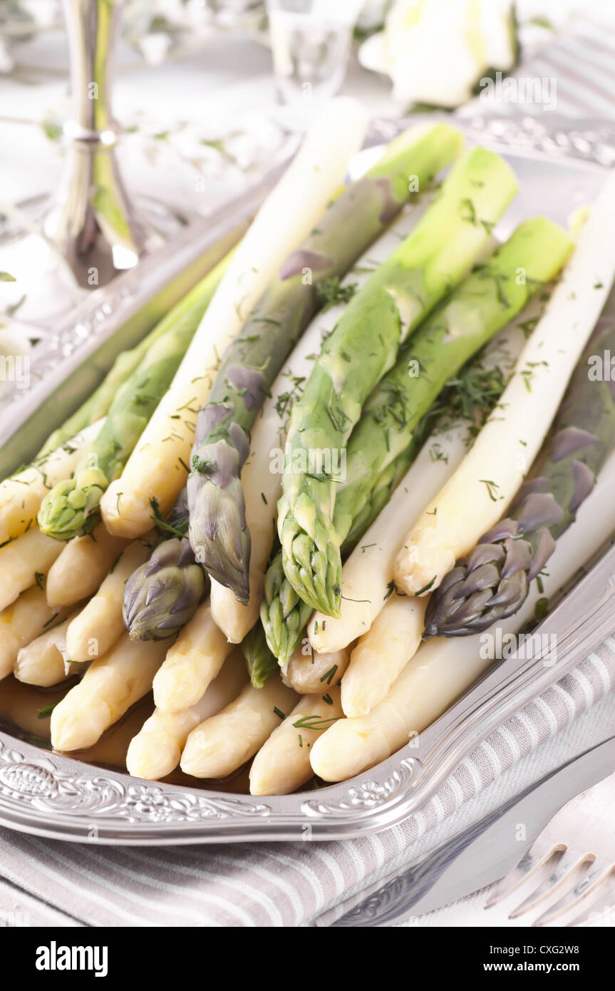 ASparagus green and white on silver tray Stock Photo