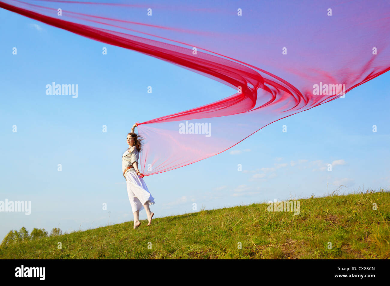 beautiful hippie girl with red fabric Stock Photo